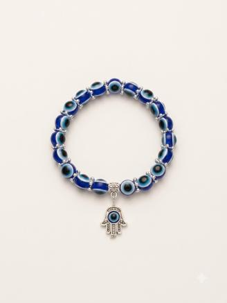 Handmade blue evil eye bracelet featuring premium blue beads and an elegant silver Hamsa hand charm.