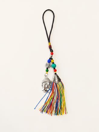Handmade Buddha head tassel hanging charm with multicolor rainbow tassel and Tibetan-inspired decorative beads.